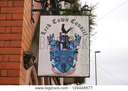 LEEK, UK - DECEMBER 31: A sign for Leek Town Council hangs outside local government offices in the small market town of Leek, in the Staffordshire Moorlands, England on December 31, 2015.