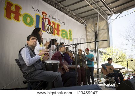 NEW YORK - APR 30 2016: Musicians perform on stage at the Holi Day Festival of Colors in Dag Hammerskjold Plaza hosted by NYC Bhangra in New York on April 30, 2016.
