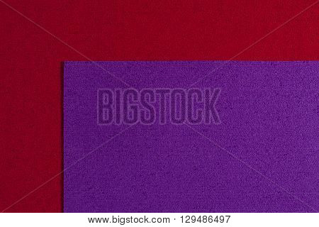 Eva foam ethylene vinyl acetate purple surface on red sponge plush background