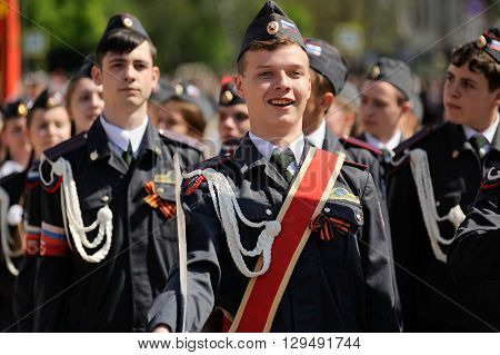 Orel Russia - May 9 2016: Celebration of 71th anniversary of the Victory Day (WWII). Young men marching in parade horizontal