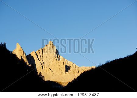 Peaks in Lescun Cirque. On the left Petite Aiguille Ansabere and to the right Grand Aiguille Ansabere. Aspe Valley, Pyrenees, France.