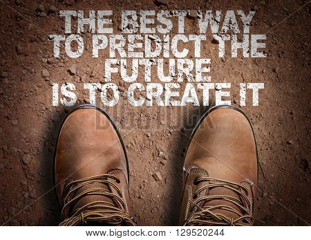 Top View of Boot on the trail with the text: The Best Way to Predict Your Future is to Create It