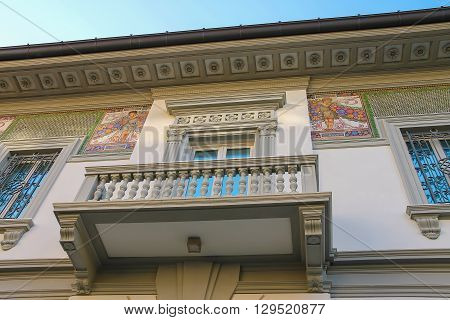 Viareggio Italy - June 28 2015: Facade with fresco of old-style design house in city centre. Viareggio is the famous resort on the coast of the Ligurian Sea