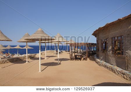 Sun umbrellas on the beach in Naama Bay