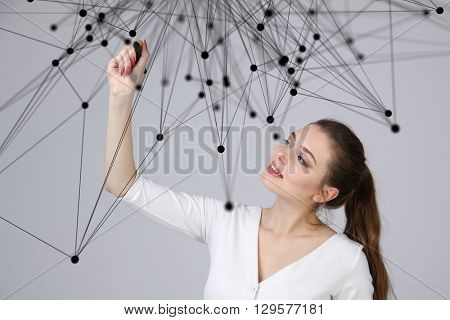 Worldwide network or wireless internet connection futuristic concept. Woman working with linked dots.