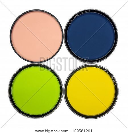 Old 8mm camera filters isolated on white background