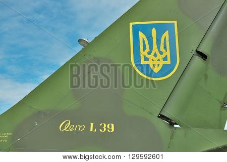 Vasilkov Ukraine - June 19 2010: Ukrainian Air Force signs on the tail fin of a training aircraft Aero L-39 Albatros