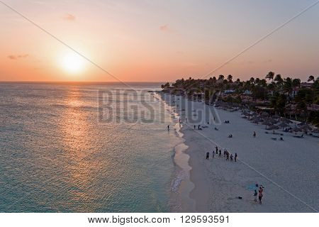 Aerial from a beautiful sunset at Manchebo beach on Aruba island in the Caribbean sea