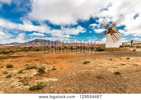 Traditional Windmill With Mountain In The Background - Fuerteventura Canary Islands Spain