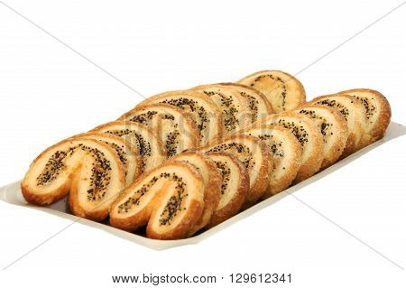 Puff pastry in the shape of a heart isolated on white background