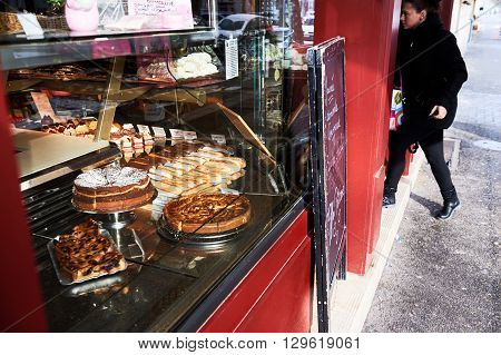 STRASBOURG FRANCE - JAN 20 2016: French traditional bakery pastry store in the center of Strabourg with diverse cakes and eclairs