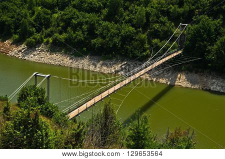 Landscape with pedestrian bridge at river Uvac gorge, southwest Serbia