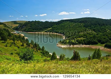 Camping area at river Uvac gorge at sunny summer morning, southwest Serbia