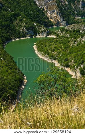 Detail of meanders at rocky river Uvac gorge on sunny morning, southwest Serbia