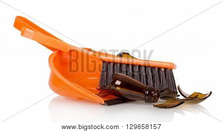 Brush the shards of glass and scoop close up isolated on white background