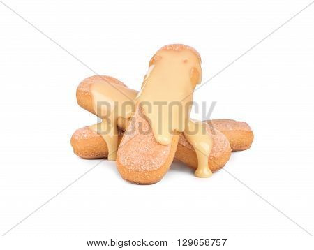 white Chocolate syrup poured on chocolate isolated on white background
