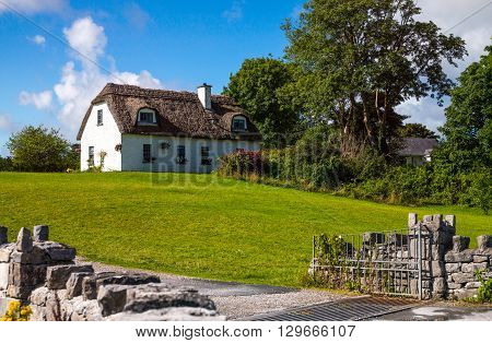 Calway Ireland - August 4 2013: Traditional country houses in the Dunguaire castle area