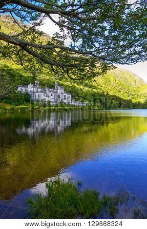 Calway Ireland - August 4 2013: Connemara area the Kylemore abbey on the Pollacappul lake
