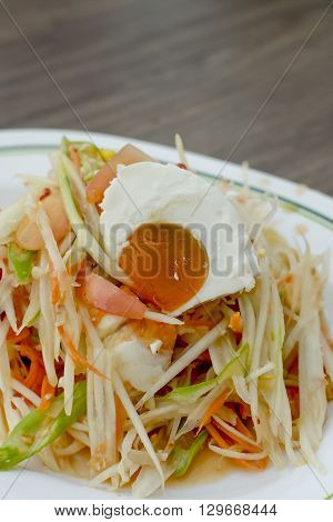 Famous Thai food Papaya salad with salted egg or what we called "Somtum Kai-Kem" in Thai Language