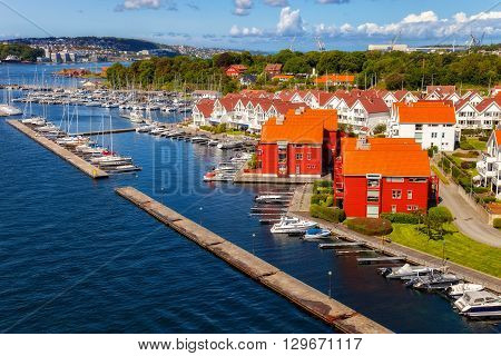 Sailboat marina with many moored sail yachts in the port of Stavanger Norway.