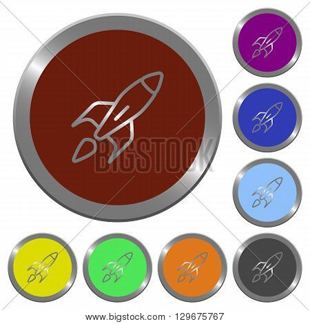 Set of color glossy coin-like rocket buttons.