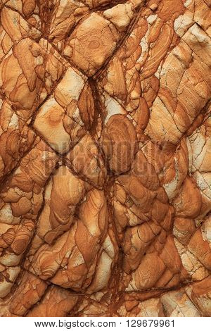 Natural marbling of volcanic rock. Found on the Banks Peninsula New Zealand.