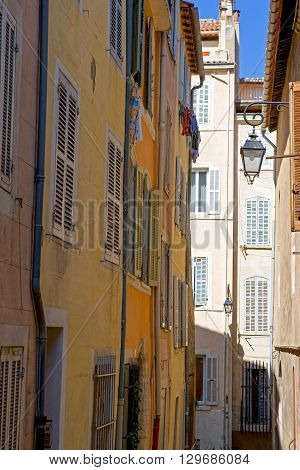 Marseille France - April 29 2006: Colored houses of a alley in the old district Le Panier