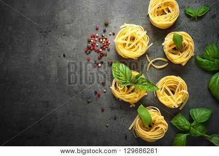 Ingredients for cooking Italian pasta. Top view with space for taxt.