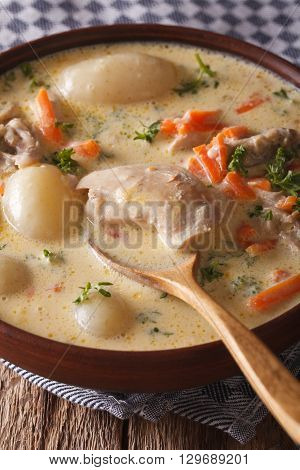 Belgian Waterzooi Soup With Chicken Close Up In A Bowl. Vertical