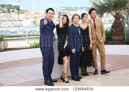  Cho Jin-Woong,  Park Chan-Wook attends 'The Handmaiden (Mademoiselle)' photocall during the 69th annual Cannes Film Festival at the Palais des Festivals on May 14, 2016 in Cannes, France.
