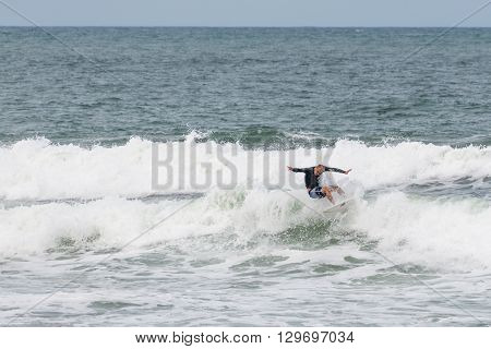 Surfers In Action At The Brava Beach In Florianopolis,