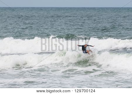 Surfers In Action At The Brava Beach In Florianopolis,