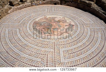 Mosaic floors of ancient roman villas with scenes from Greek mythology - battle of Theseus and Minotaur in labyrinth archaeological park Tombs of Kings,Paphos,Cyprus,unesco heritage