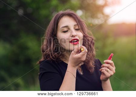 Beautiful Curly Girl In The Woods