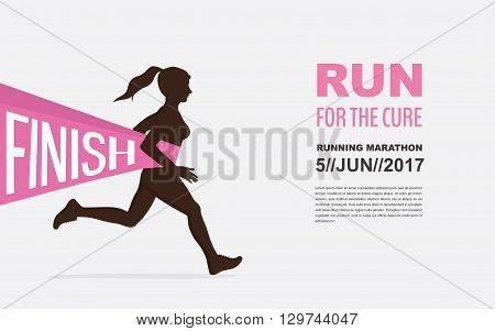 number one winner at  a finish  line. breast cancer awareness. run for a good cause
