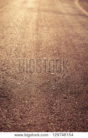 mpty asphalt roadway with sunlight for design