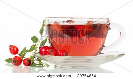Cup of tea from rose hips isolated on a white background.