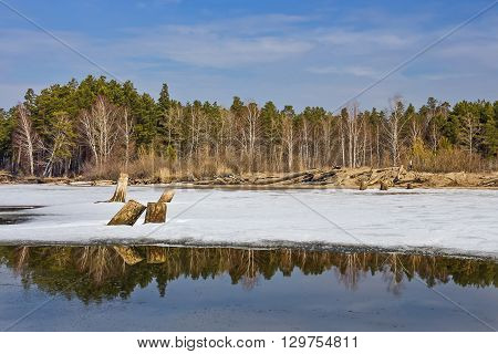 Spring melting of ice on the river. Russia Siberia Novosibirsk region Ob river