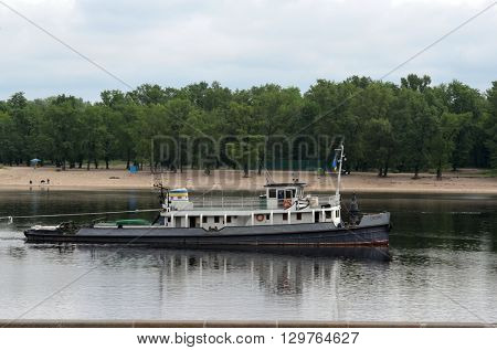 KIEV,UKRAINE - MAY 15, 2016: Pleasure boats on the Dnepr River and river shore in historical area. Kiev. Ukraine