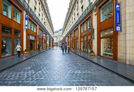 Paris France - October 5 2009: People valking between the stores of Edouard VII street.