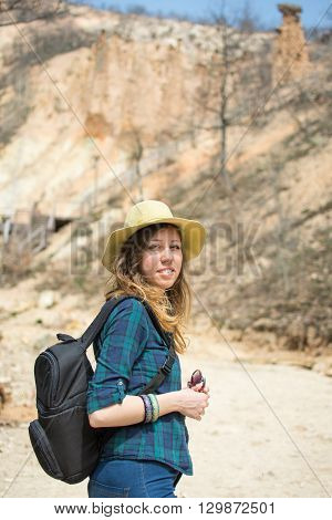 Woman Hiker With Backpack Outdoors