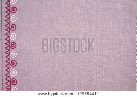 Linen napkin with hand-embroidered traditional folk ornament