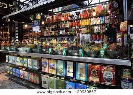 TEL AVIV, ISRAEL - APRIL 7, 2016 : Assortment of marinated olives on stall in Sarona Gastro Market, Tel Aviv, Israel. Recently open Sarona Market became the most popular place in Tel Aviv.