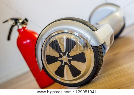 charging a hoverboard with fire extinguisher nearby