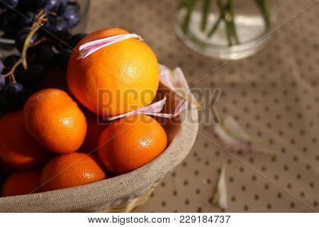 Oranges In A Basket On The Table