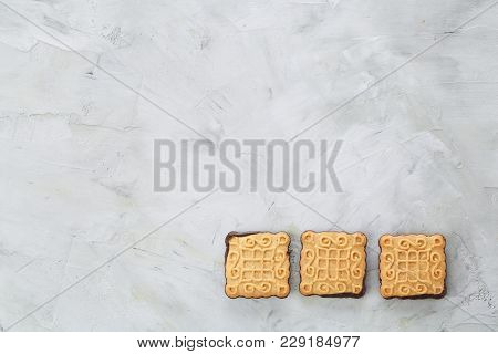 Square Cookies Arranged In Pattern On Light Textured Background, Close-up, Shallow Depth Of Field, S