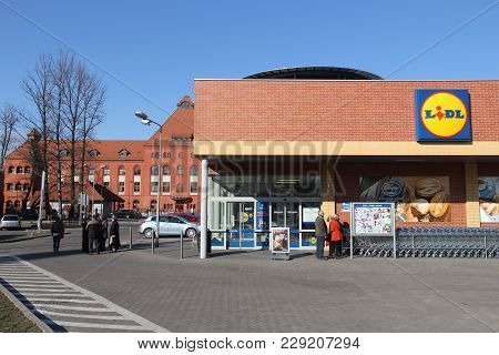 Siemianowice Slaskie, Poland - March 9, 2015: People Visit Lidl Discount Store In Siemianowice Slask