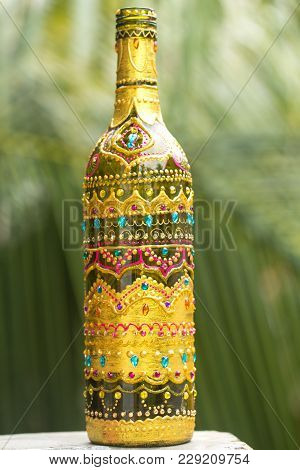 Decorative Glass Bottle Is Painted And Decorated With Rhinestones