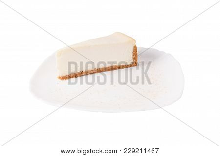 Classic Cheesecake On A White Plate Isolated On White