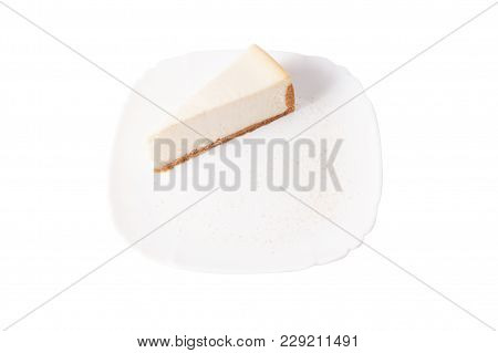 Classic Cheesecake On A White Plate Isolated On White
